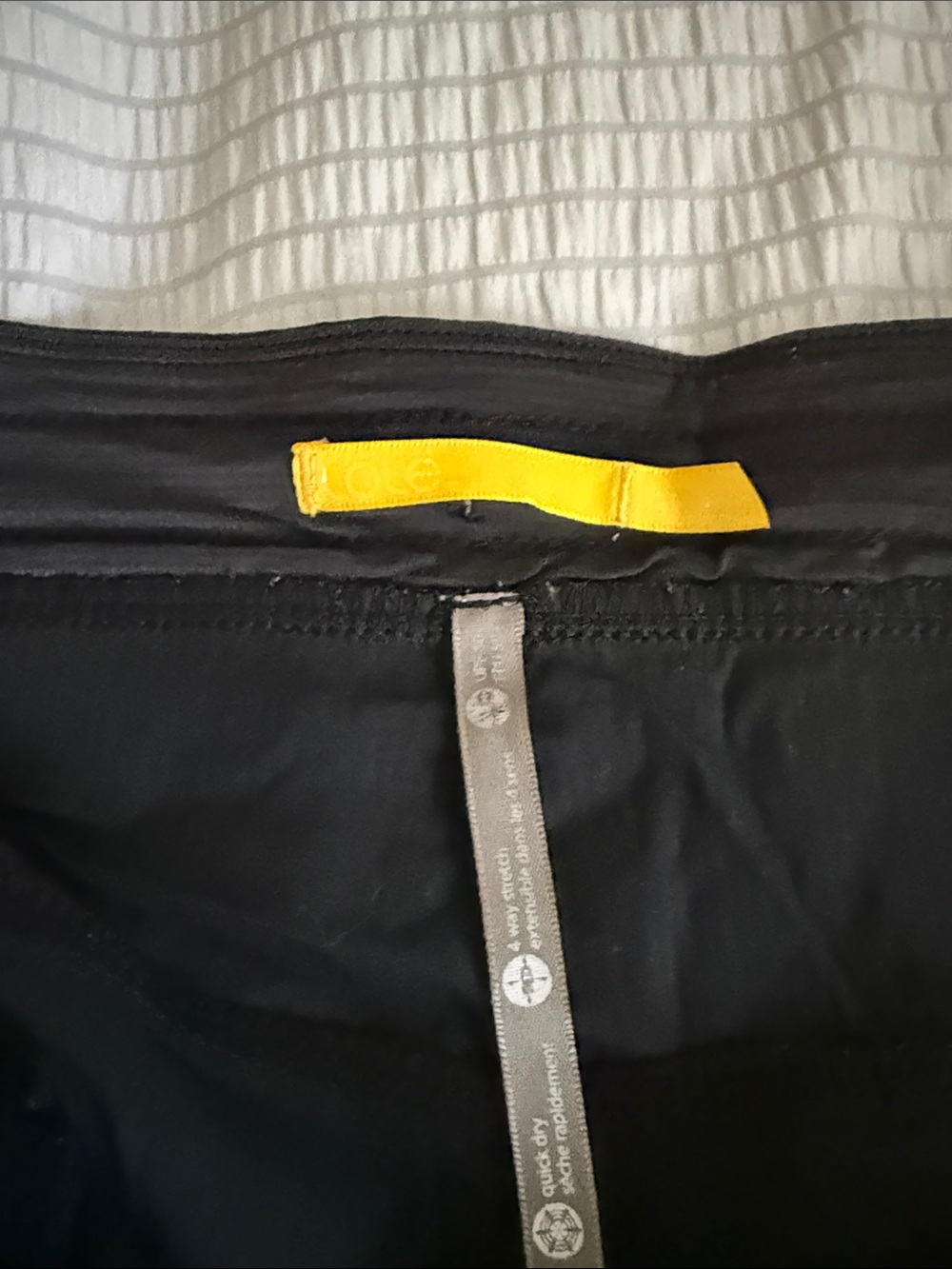 Lole Black Shorts with Yellow Waist Tab - Picture 2 of 4